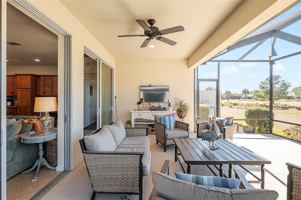 9595 Southwest 70th Loop Ocala, FL 34481 - Photo 45 of 100 a view of a livingroom with furniture and a large window