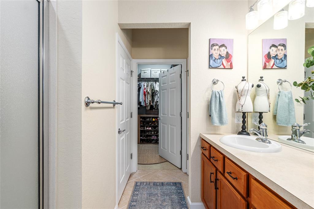 9595 Southwest 70th Loop Ocala, FL 34481 - Photo 53 of 100 a bathroom with a sink vanity and a mirror