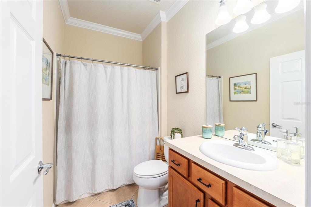 9595 Southwest 70th Loop Ocala, FL 34481 - Photo 59 of 100 a bathroom with a sink toilet and shower