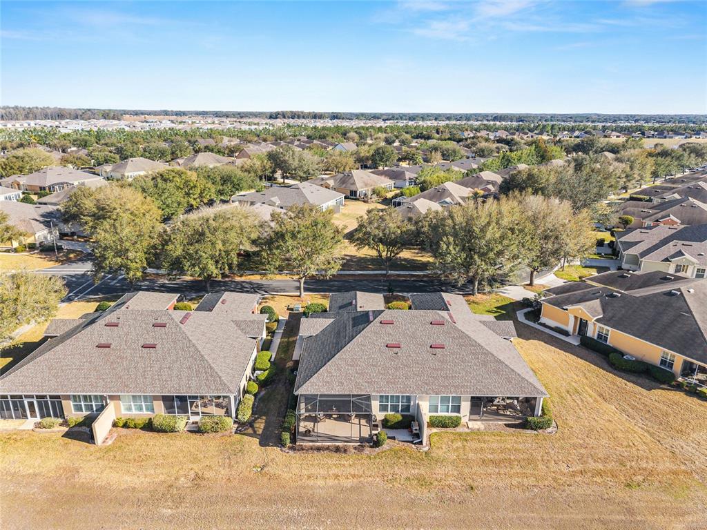 9595 Southwest 70th Loop Ocala, FL 34481 - Photo 63 of 100 an aerial view of residential houses with outdoor space