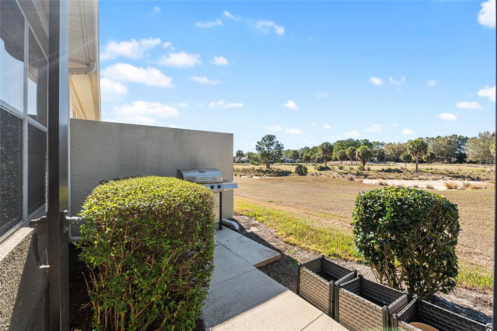 9595 Southwest 70th Loop Ocala, FL 34481 - Photo 64 of 100 a view of a lake with a outdoor space