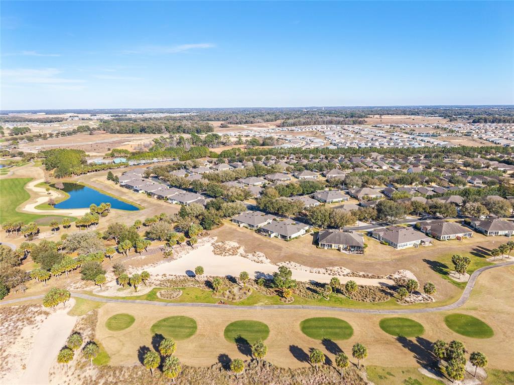 9595 Southwest 70th Loop Ocala, FL 34481 - Photo 73 of 100 an aerial view of residential building with an outdoor space