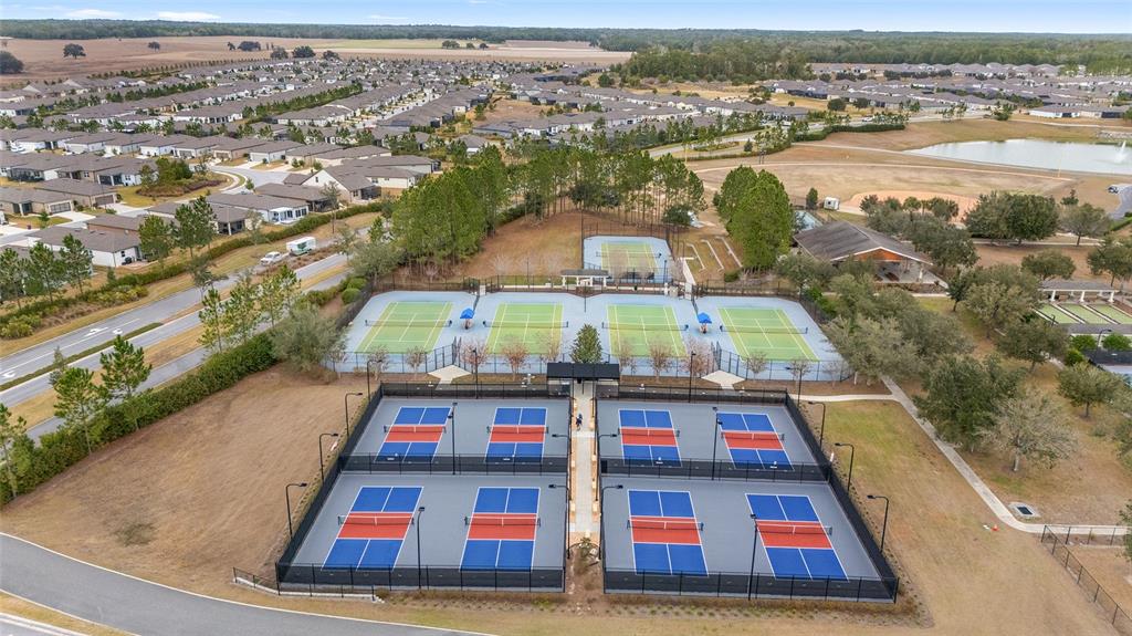 9595 Southwest 70th Loop Ocala, FL 34481 - Photo 96 of 100 an aerial view of residential houses with outdoor space