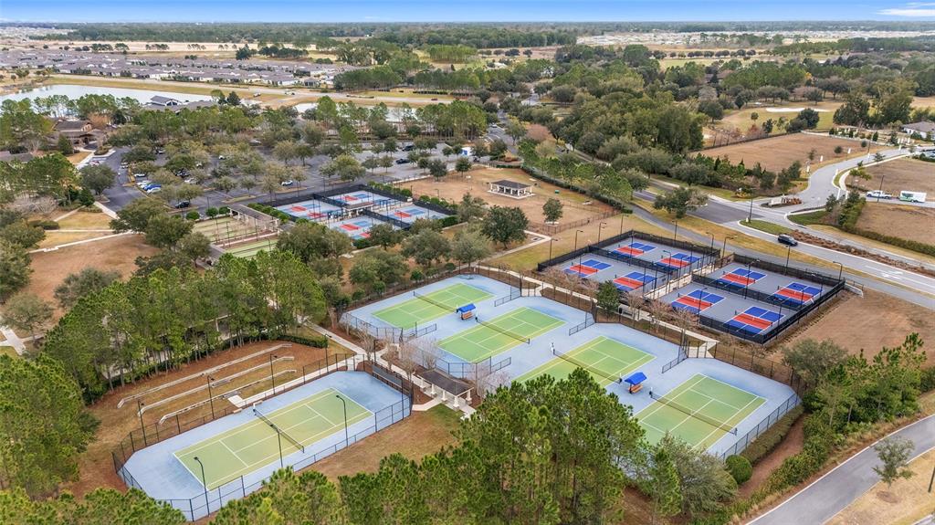 9595 Southwest 70th Loop Ocala, FL 34481 - Photo 99 of 100 an aerial view of residential houses with outdoor space