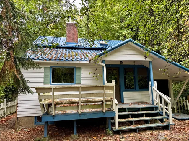 a view of deck with wooden floor and outdoor seating