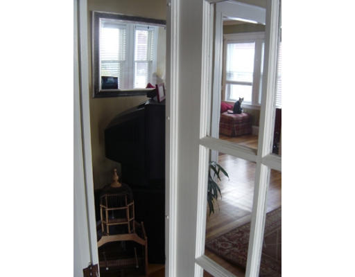 66 Parmenter Road, Unit 66 Waltham, MA 02453 - Photo 27 of 29 a view of a hallway