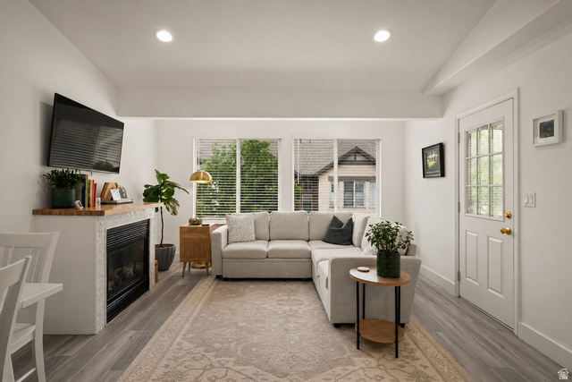 204 Lyman Lane Bountiful, UT 84010 - Photo 3 of 28 Bright living area featuring wood-finish flooring, recessed lighting, and a white paneled entry door with glass inserts