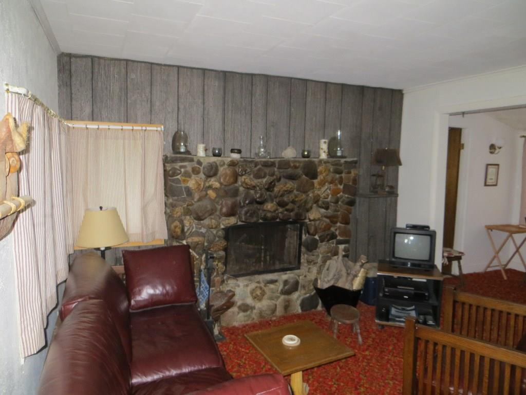 560 Barnbrook Road Sinclair, ME 04779 - Photo 11 of 32 Living Room with Wood Burning Fireplace.