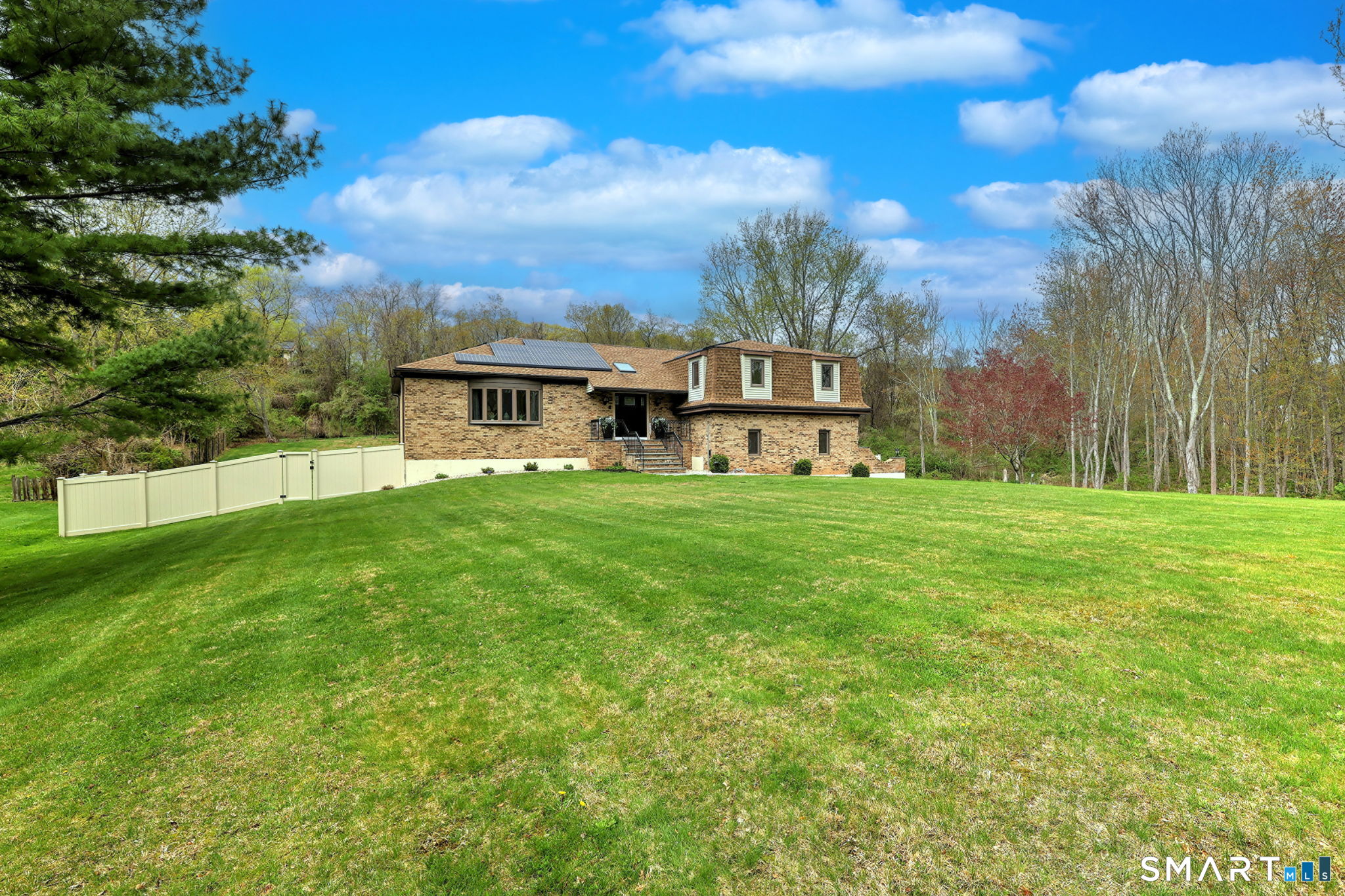 2262 Ridge Road North Haven, CT 06473 - Photo 17 of 40 a view of a house with a big yard