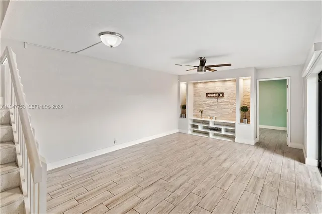 a view of livingroom with furniture and wooden floor