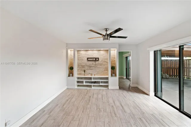 a view of entryway with wooden floor