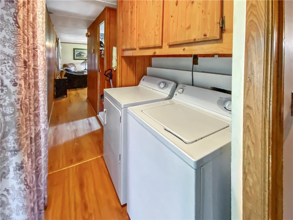 391 Garner Road Edinburg, PA 16116 - Photo 14 of 17 a utility room with dryer and washer