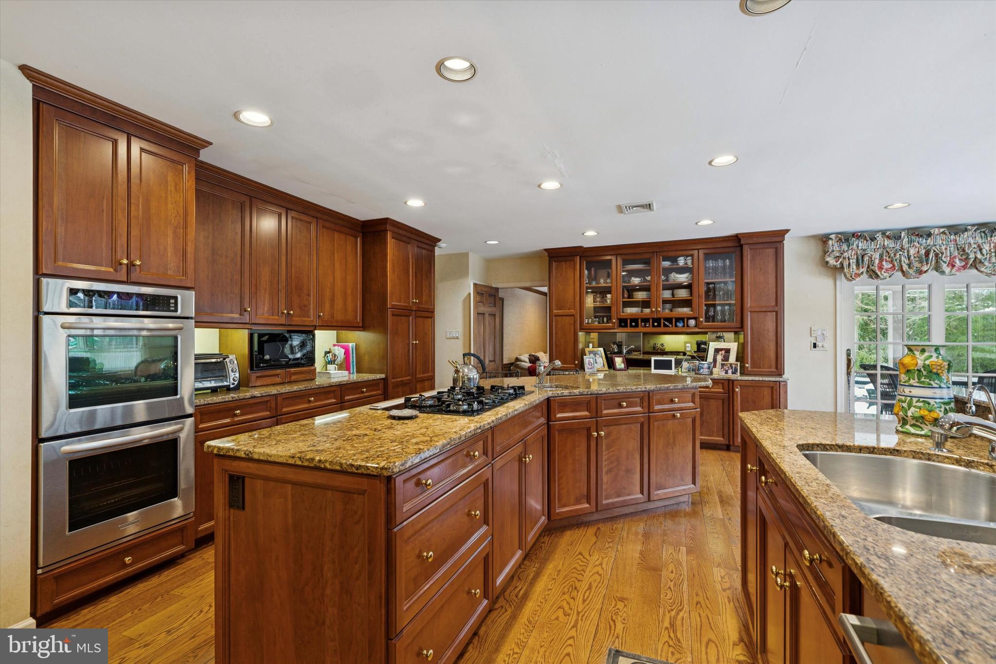 736 Woodleave Road Bryn Mawr, PA 19010 - Photo 15 of 44 a kitchen with a sink stove top oven and microwave