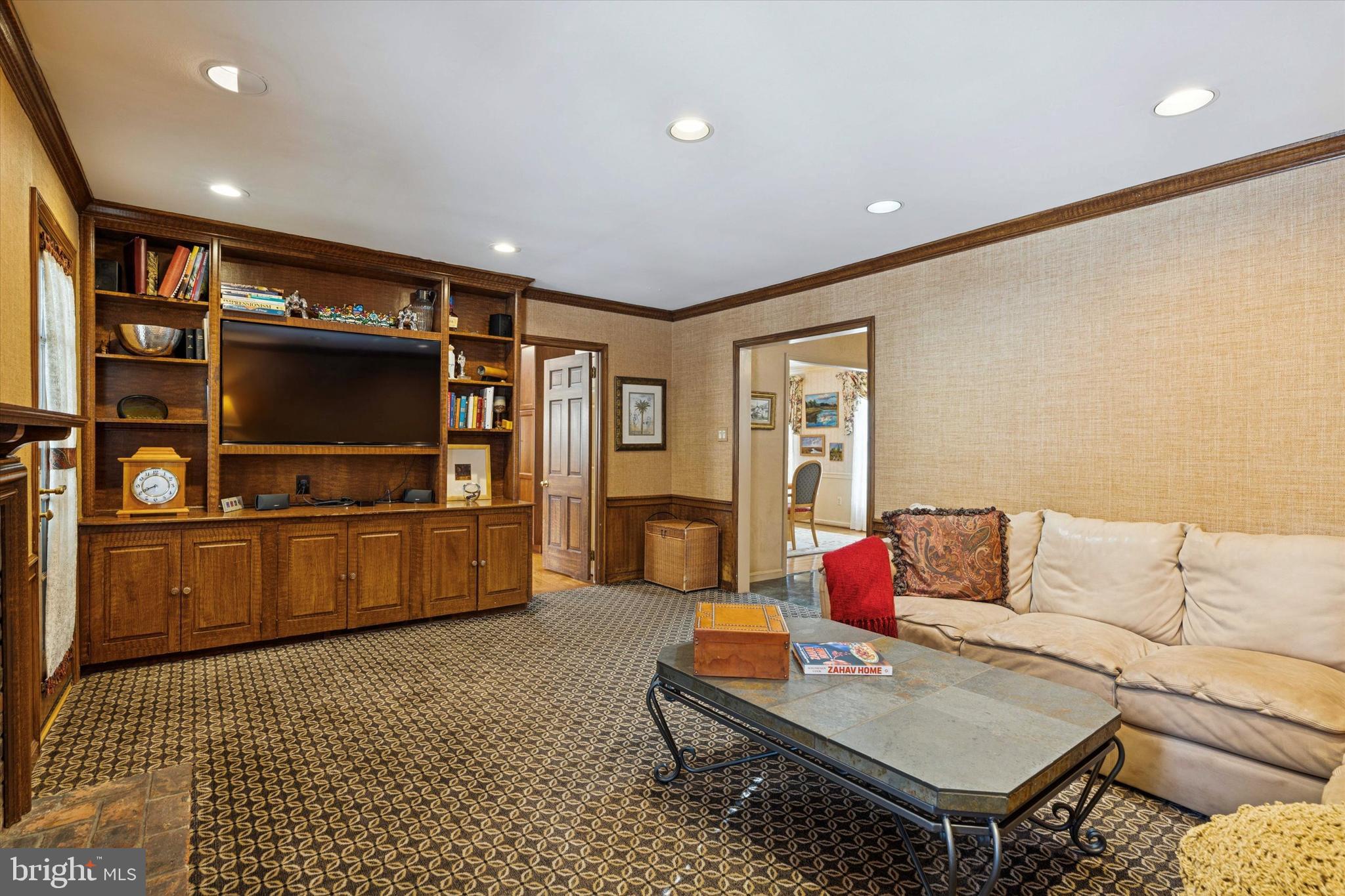 736 Woodleave Road Bryn Mawr, PA 19010 - Photo 21 of 44 a living room with furniture and a flat screen tv