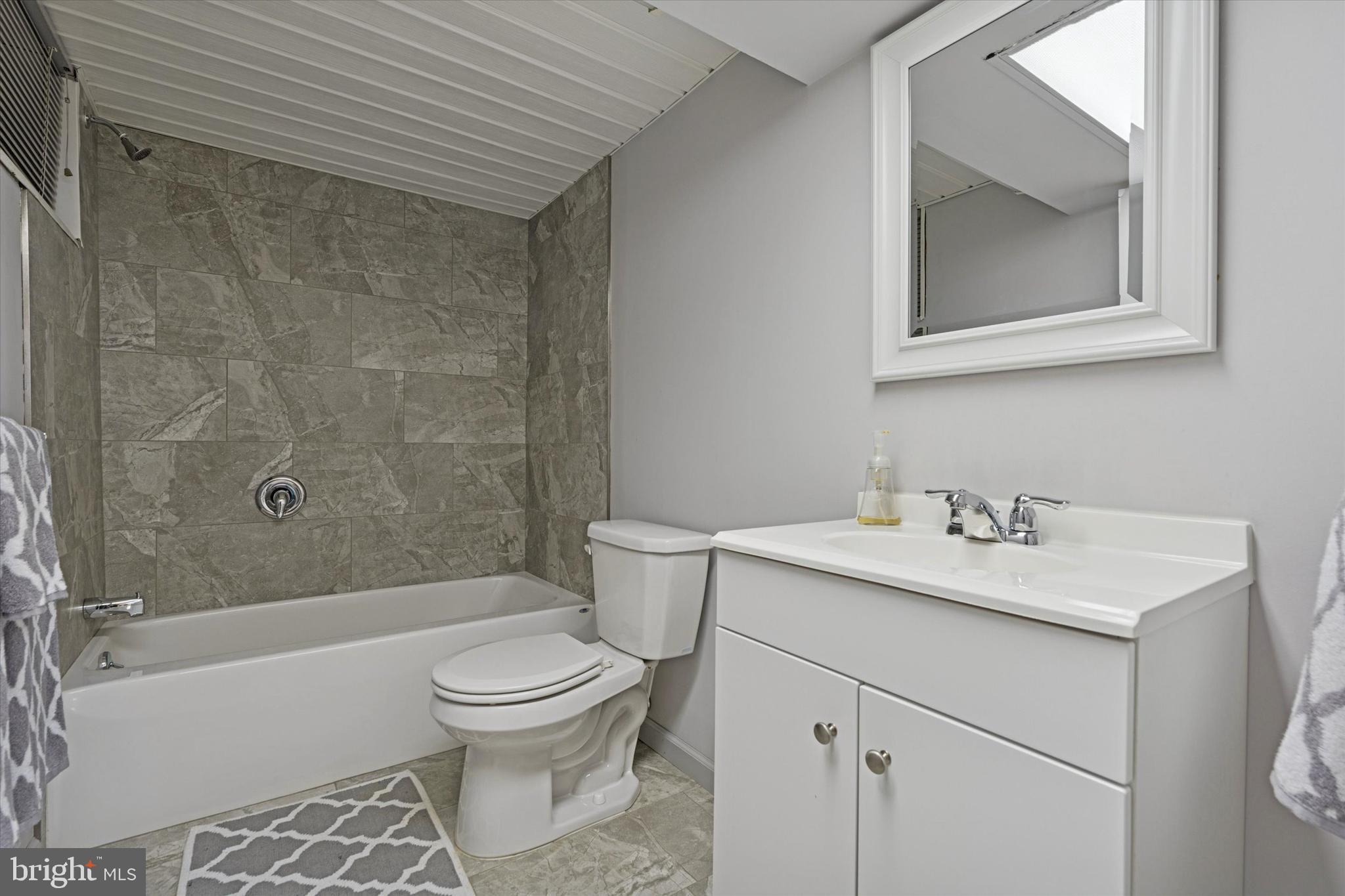 736 Woodleave Road Bryn Mawr, PA 19010 - Photo 41 of 44 a bathroom with a sink toilet and shower