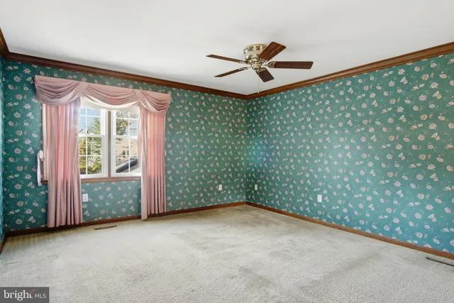 a view of a room with a window