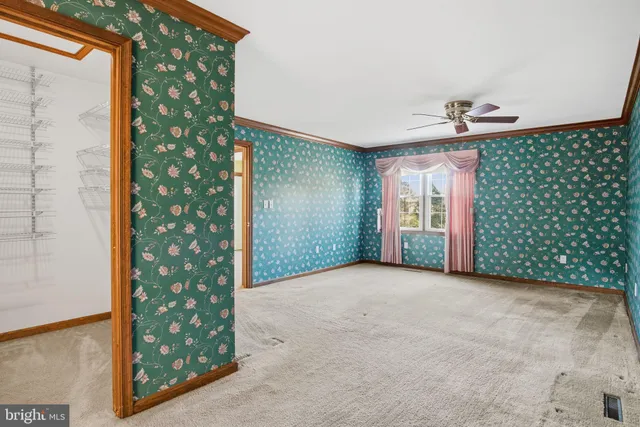 a view of a hallway with windows