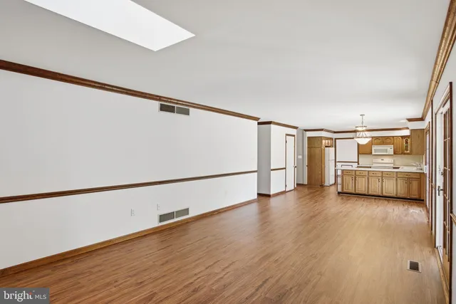 a view of a livingroom with wooden floor
