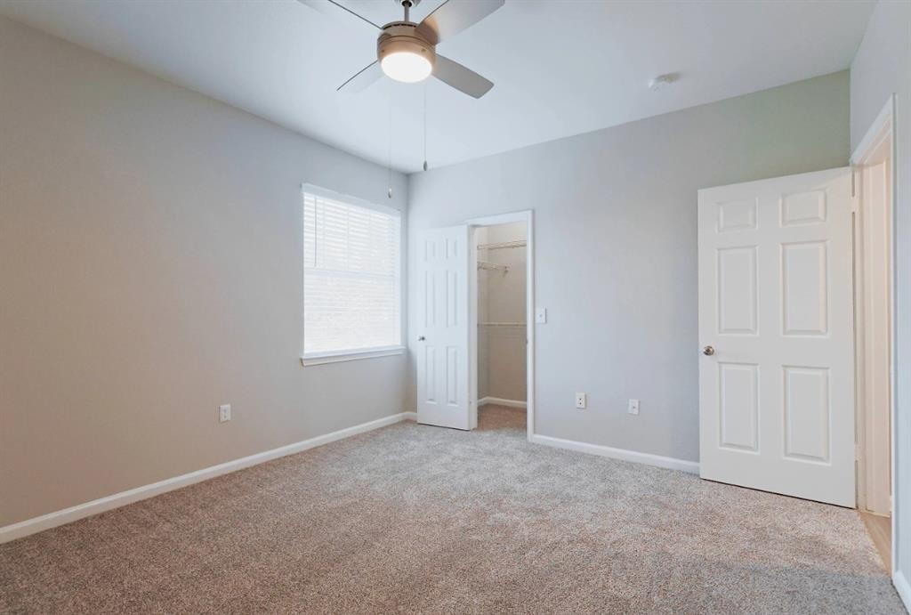 10505 I-35 Frontage Road South, Unit 1737 Austin, TX 78747 - Photo 20 of 23 a view of an empty room with a window