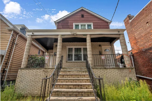 a front view of a house with a door