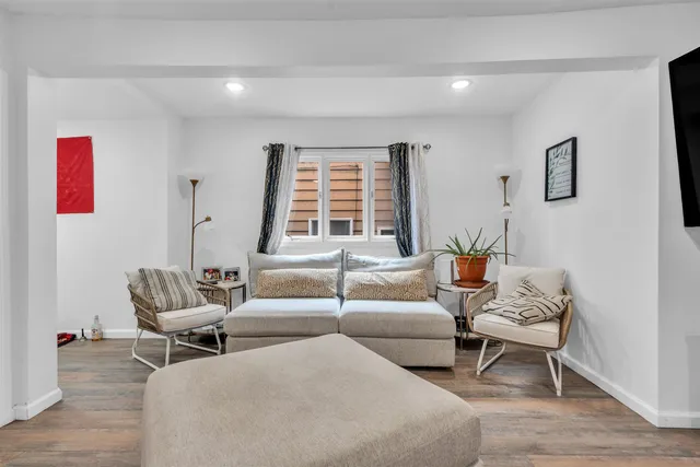 a living room with furniture and window