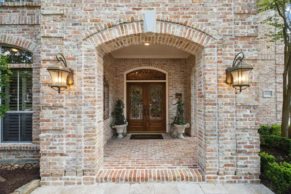 a front view of a house with a glass door