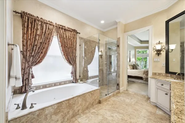 a view of a patio with table and chairs and potted plants