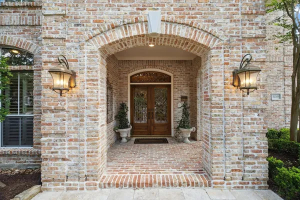 a front view of a house with a glass door