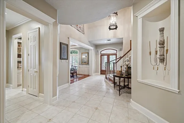 a living room with furniture and a table