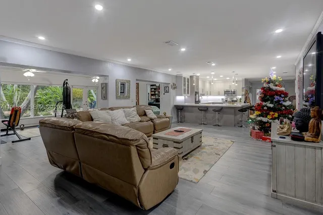 a spacious bathroom with a toilet sink and mirror