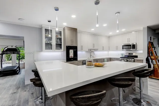 a view of a swimming pool with sitting area