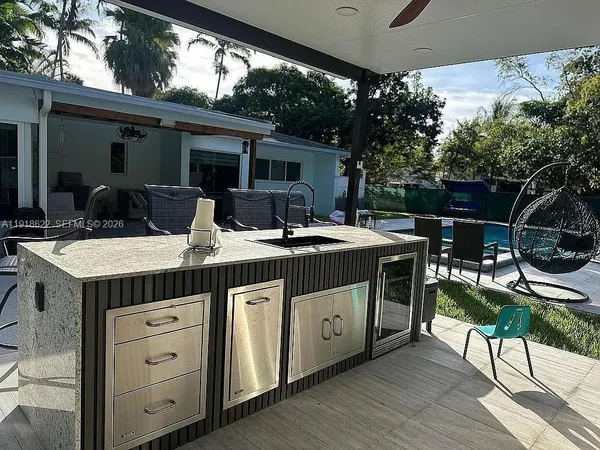 a view of a backyard with a fountain