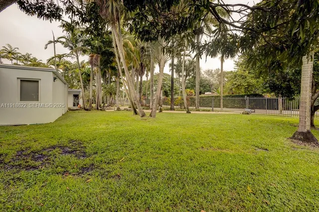 a view of a house with a swimming pool