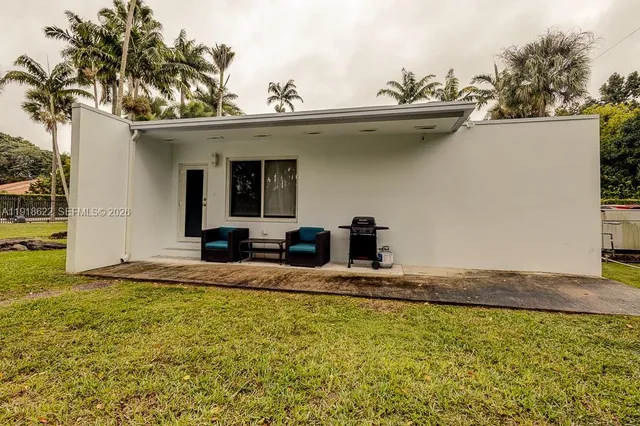 a close up of a flower in a garden