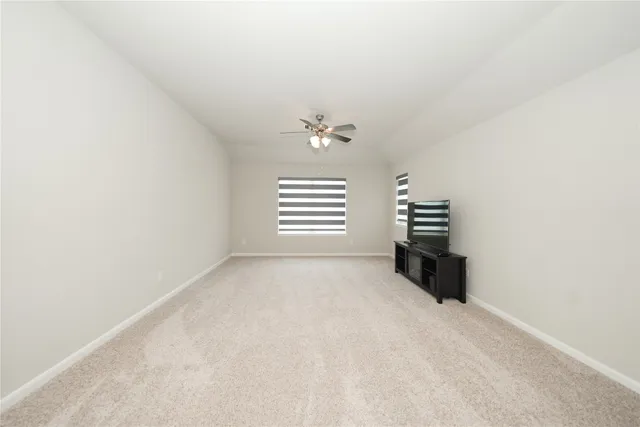 en view of an empty room with a window