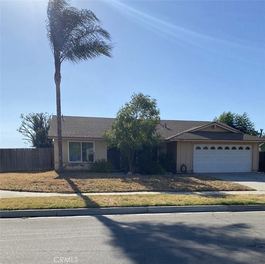 12742 Reed Avenue Grand Terrace, CA 92313 - Photo 1 of 1 a view of the house with a swimming pool