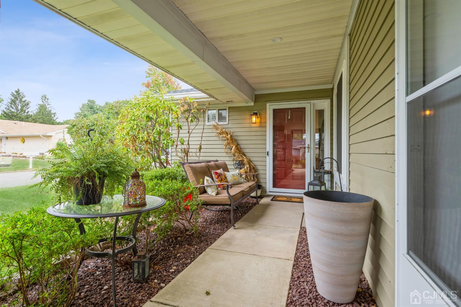735 Prospect Road, Unit A Monroe Township, NJ 08831 - Photo 2 of 20 a backyard of a house with yard and outdoor seating