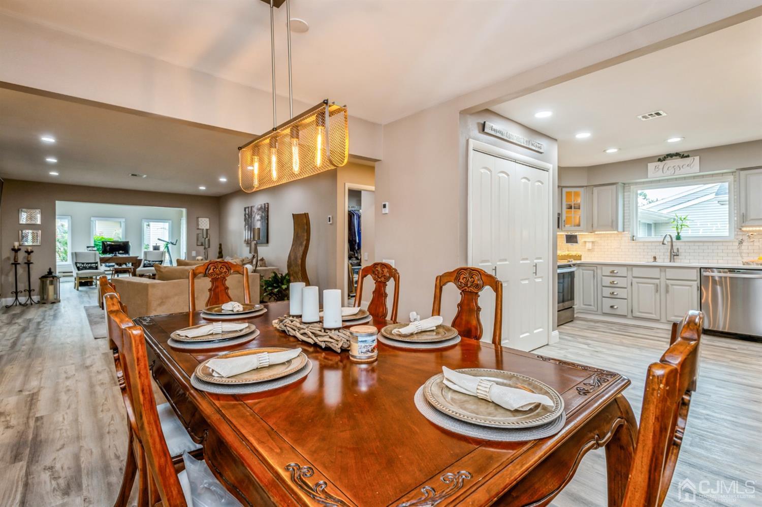 735 Prospect Road, Unit A Monroe Township, NJ 08831 - Photo 13 of 20 a dining room with furniture a table and kitchen view