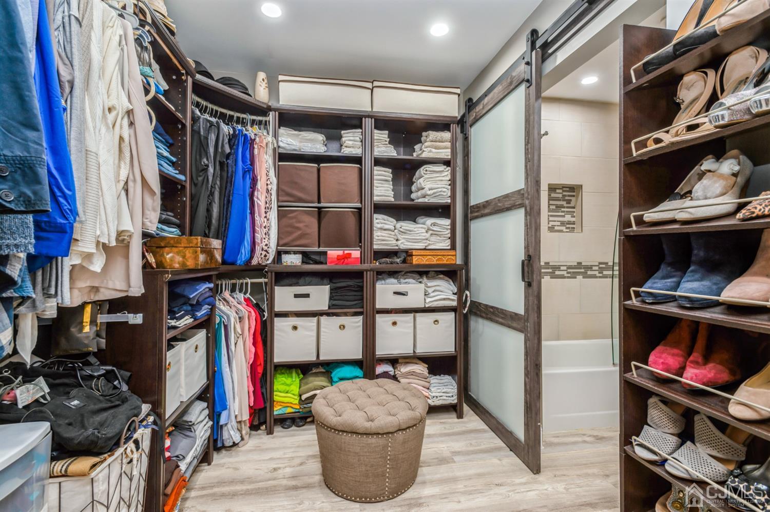 735 Prospect Road, Unit A Monroe Township, NJ 08831 - Photo 16 of 20 a room with lots of different colored cloths