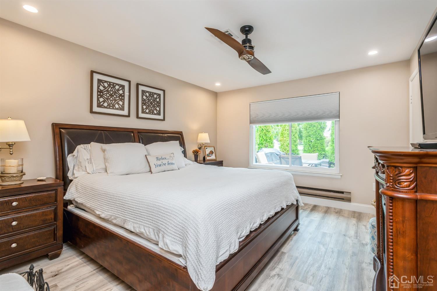735 Prospect Road, Unit A Monroe Township, NJ 08831 - Photo 19 of 20 a bedroom with a bed and a window