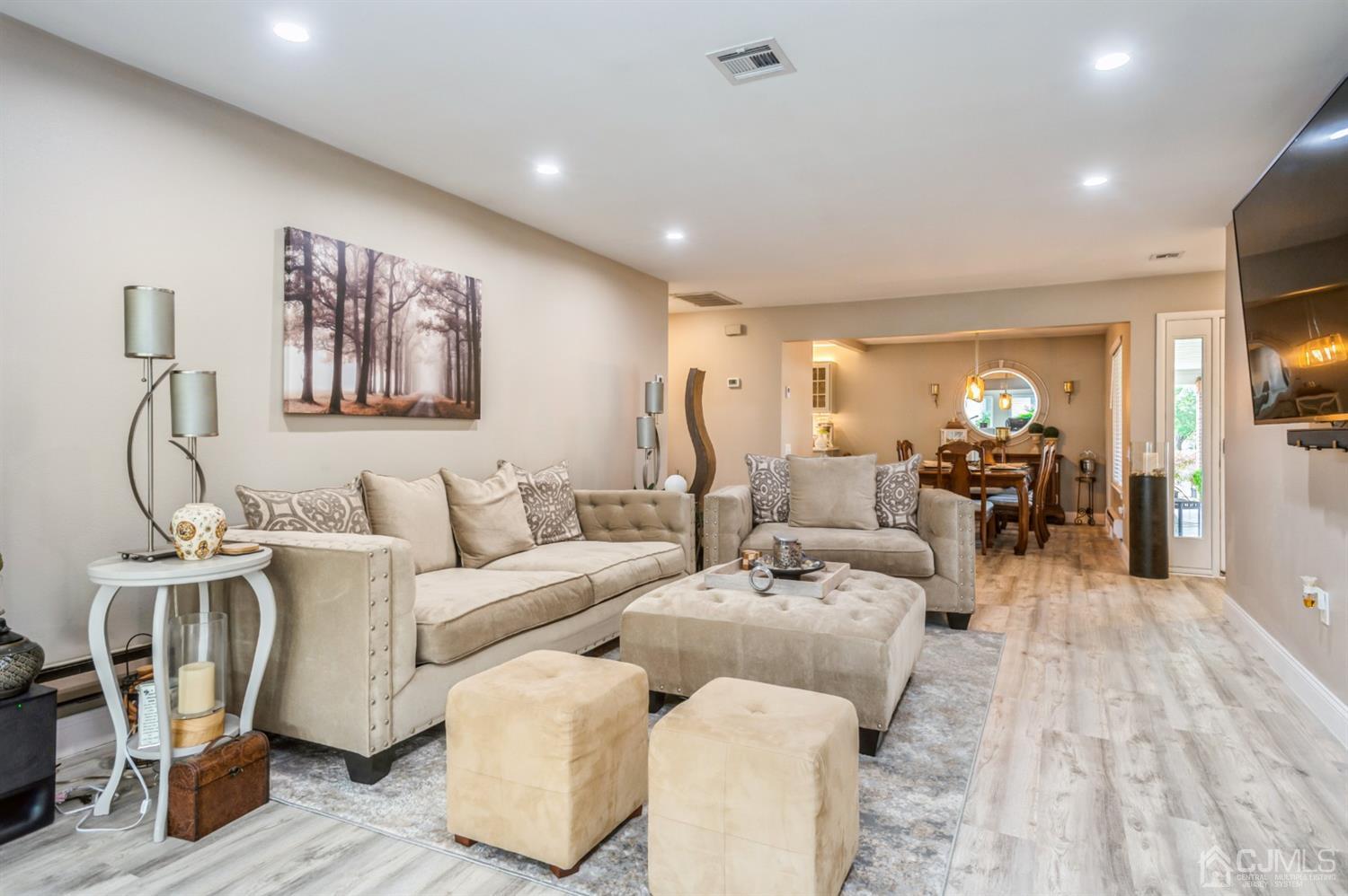 735 Prospect Road, Unit A Monroe Township, NJ 08831 - Photo 4 of 20 a living room with furniture and a wooden floor