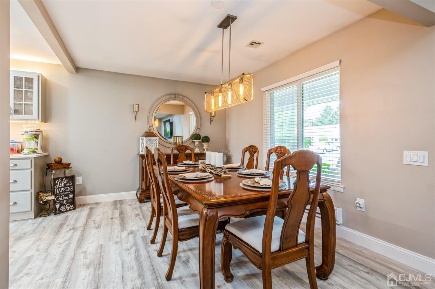 735 Prospect Road, Unit A Monroe Township, NJ 08831 - Photo 10 of 20 a view of a dining room with furniture and a window