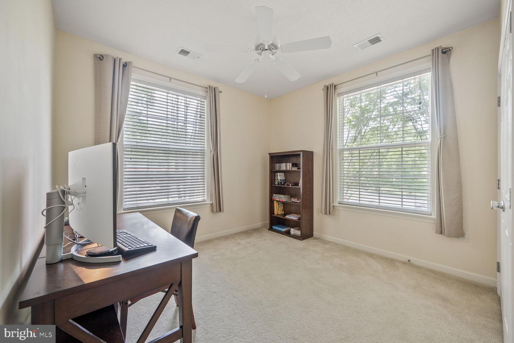 7 Booth Street, Unit 202 Gaithersburg, MD 20878 - Photo 14 of 32 a view of workspace with a window
