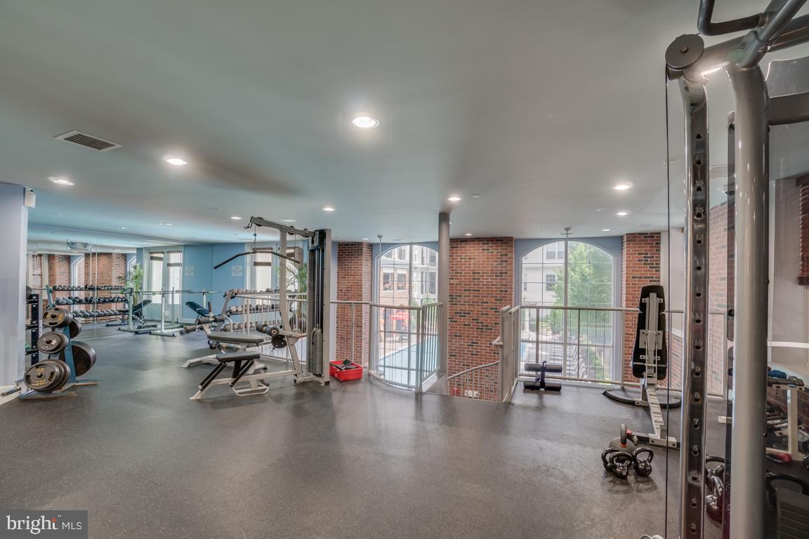 7 Booth Street, Unit 202 Gaithersburg, MD 20878 - Photo 24 of 32 a view of a room with gym equipment