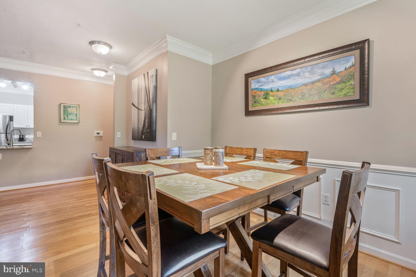 7 Booth Street, Unit 202 Gaithersburg, MD 20878 - Photo 8 of 32 a view of a dining area with furniture