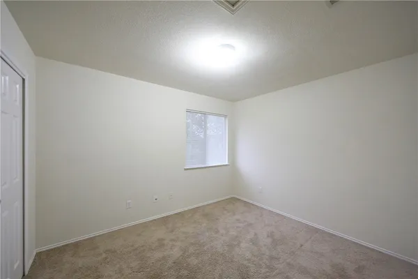 an empty room with a workbench