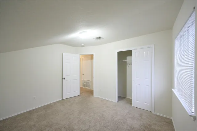 an empty room with an entryway