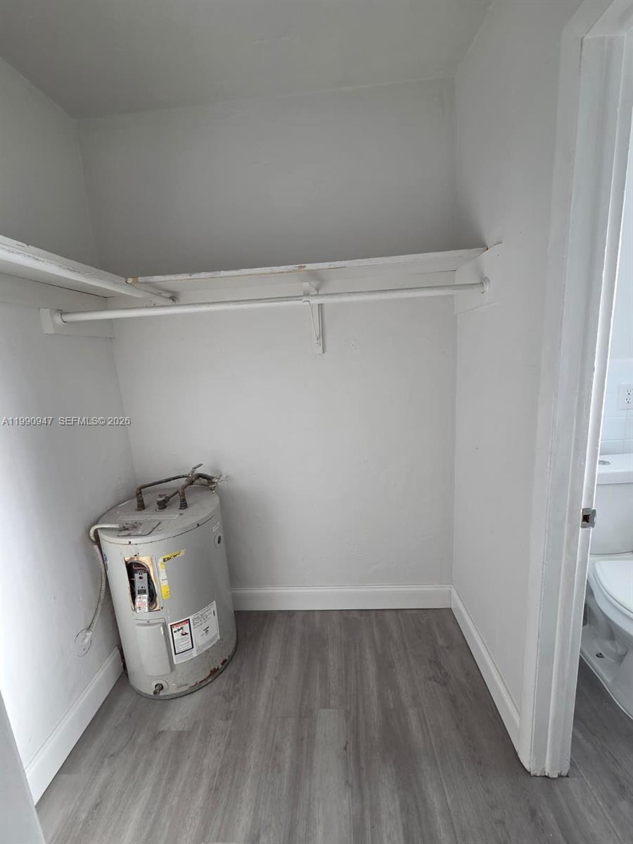 1628 Southwest 7th Street, Unit 4 Miami, FL 33135 - Photo 6 of 6 a view of storage and utility room with racks on the wall