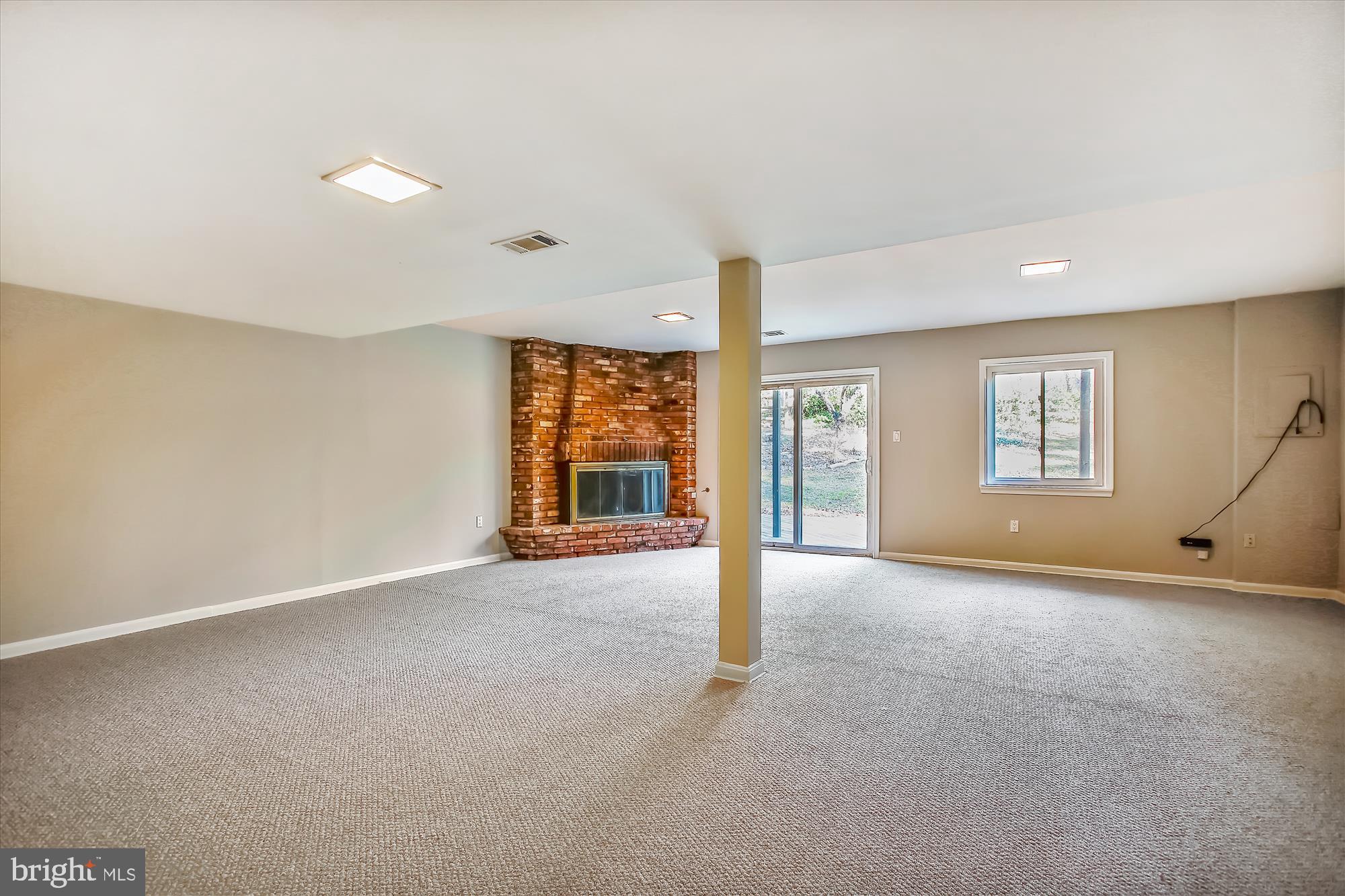 11042 Saffold Way Reston, VA 20190 - Photo 36 of 50 LL Rec Room with new paint/carpet and gas FRPL