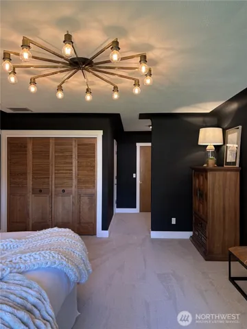 a view of a livingroom with a workspace